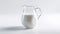 Glass jug of milk on white background