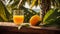 A glass juice beverage mango on a sweet of sea and refreshment trees tropical sunlight fresh