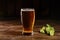 Glass of light beer on a dark pub. Glass beer on wood background with copy space