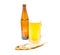 Glass of light beer and stockfish closeup