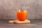 Glass of Mango juice on dark background. Freshly squeezed juice from Australian mango fruits