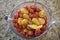 Glass Measuring Cup of Chopped Cherry Tomatoes