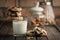 A glass of milk and cookies with raisins. A wooden table and a brick wall on a background. Selective focus.