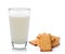Glass of milk and cracker isolated on white
