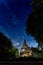 Glass mosaic Stupa at Wat Phra That Doi Khao Kwai a Buddhist Temple at Chiang Rai Thailand. A stupa at starry night