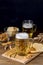 Glass Mug of Tasty Light Beer and Snacks on Wooden Table Pretzel Cracker with Solt Vertical