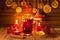 Glass of mulled wine and Christmas decorations, candles, gifts