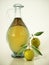 Glass olive oil bottle and raw olives isolated on white background. 3D illustration