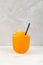 Glass of Orange Granizado. Spanish Refreshing summer iced drink. Slush fruit drink. Sweet Shaved ice