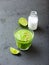 Glass of organic avocado and cucumber smoothie with lime