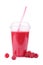 A glass of pink berry smoothie isolated on a white background. Raspberries next to a yogurt. Thick raspberry milkshake.
