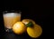 Glass of potato juice on dark wooden background