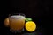 Glass of potato juice on dark wooden background