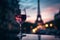 Glass of red wine on a table of outdoor restaurant in Paris on sunset. Generative AI