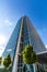 Glass reflective office buildings against blue sky