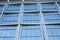 Glass reflective windows of office building in the