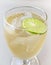 Glass of refreshing cold ginger ale with lemon