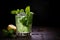 glass of refreshing minty mojito with a sprig of fresh mint