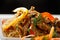 Glass rice noodles served with beef closeup