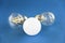 Glass round electric lamps for lighting on a blue background