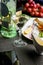 glass of semi-dry white wine  an aperitif. Wine with grilled meat and vegetables. Close-up. Concept - table setting in a