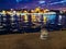 Glass snow globe of Istanbul against the backdrop of a blurry night cityscape. View of the tourist center of Turkey with the