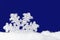 Glass snowflake on blue