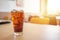 Glass of soft drinks placed on the table gives a refreshing feeling when drinking with mixed sugar and caffeine. with copy spaces
