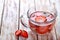 A glass of strawberry infused water