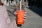 Glass of strawberry and mango bubble tea closeup in woman hand