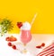 Glass of strawberry milkshake or smoothie. Summer healthy vitamin beverage, diet or vegan food