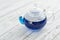 Glass teapot with blue Anchan tea