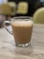 A glass of `Teh Tarik` or milk tea