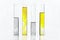 Glass test tubes or flasks with Ultimate Gray and Illuminating Yellow