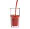 A glass of tomato juice pour