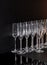 Glass transparent glasses for champagne on a black background