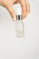 Glass transparent and matt bottle with serum or oil in glass bottle and pipette