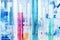 Glass tubes used in scientific laboratories, light blue background