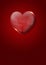 Glass valentine heart over dark red background