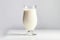 Glass vanilla milkshake glass. Generate Ai