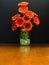 Glass Vase Holds Burnt Orange Daisies