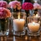 Glass votive candles surrounded by mini carnations.AI generated