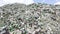 Glass waste in recycling facility. Pile of bottles. Zoom out.