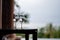 Glass of water on balcony, Tropical view