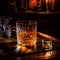A glass of whiskey close-up. Product photography. Glass of old whiskey standing on a table in a luxury bar. Composition of whiskey