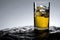 A glass of whiskey liquor with ice studio commercial promotion and marketing product background
