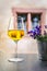 A glass of white wine at a restaurant in Riquewihr, France, Alsatian Wine Route