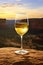 A glass of white wine at sunset. Australian wine concept.
