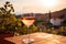 Glass of white wine on table in vineyard in Tuscany, Italy, A chilled glass of rosÃ© wine against a backdrop of vineyards, AI