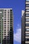 Glass windows and bulconys patterns on surface of residentcial condominiums in the city